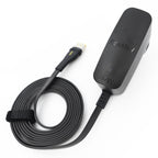 Black electronic device with cable on a white background