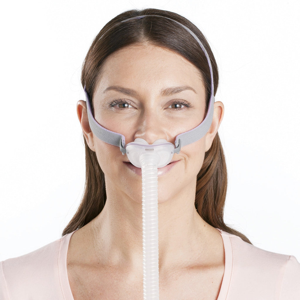 Woman wearing an AirFit P10 for her Nasal Pillow Mask 