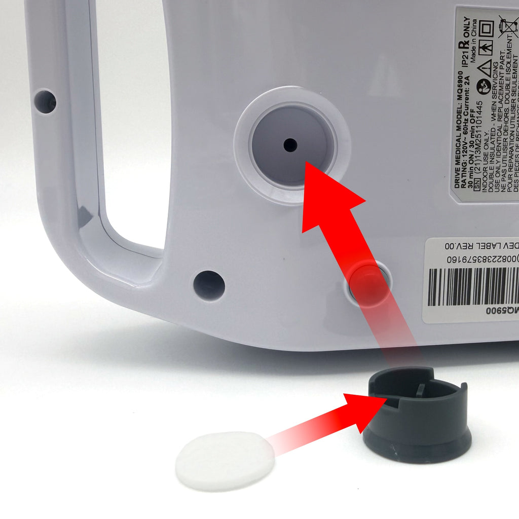 Medical device with a red arrow pointing to a small hole, accompanied by a black cap and white object on a white background.