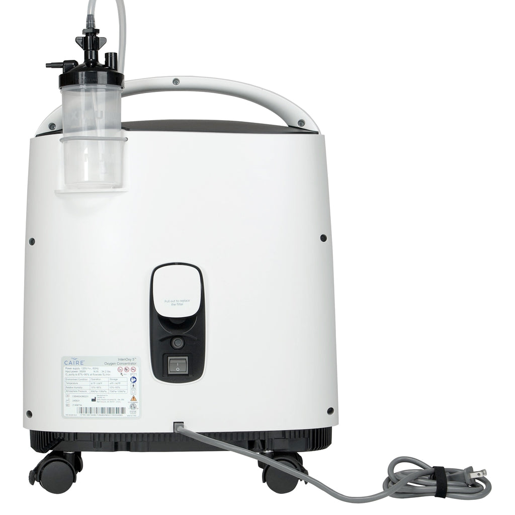 White medical device with a hose on a white background