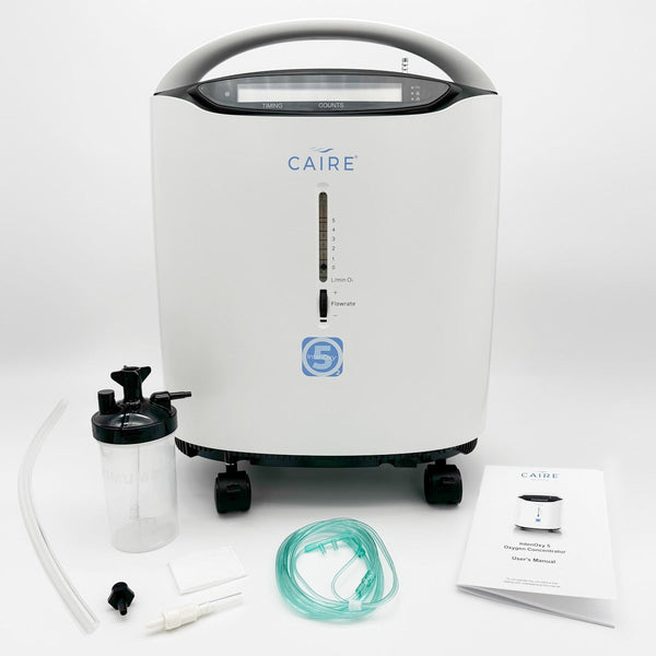 Intenoxy5 Caire Oxygen Concentrator with humidifier bottle, tubing, cannula, connector, filters and user manual 