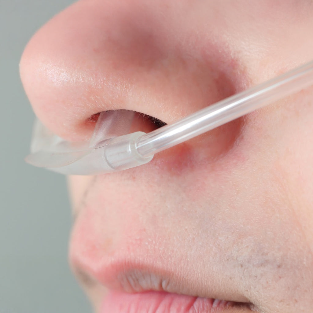 over the ear nasal cannula with lip tab