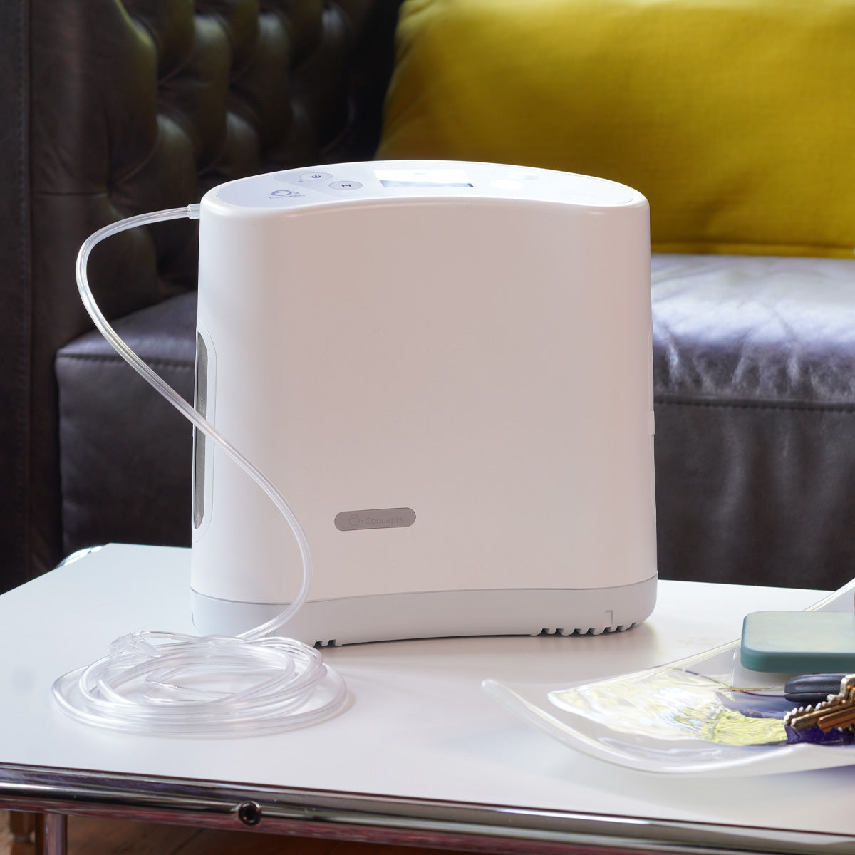 Liberty 2 Portable Oxygen Concentrator on a table with tubing attached
