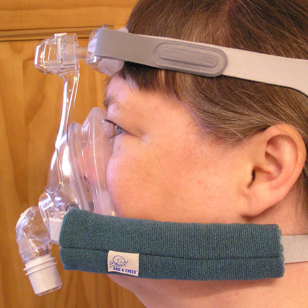pad a cheek cpap headgear strap wraps in use