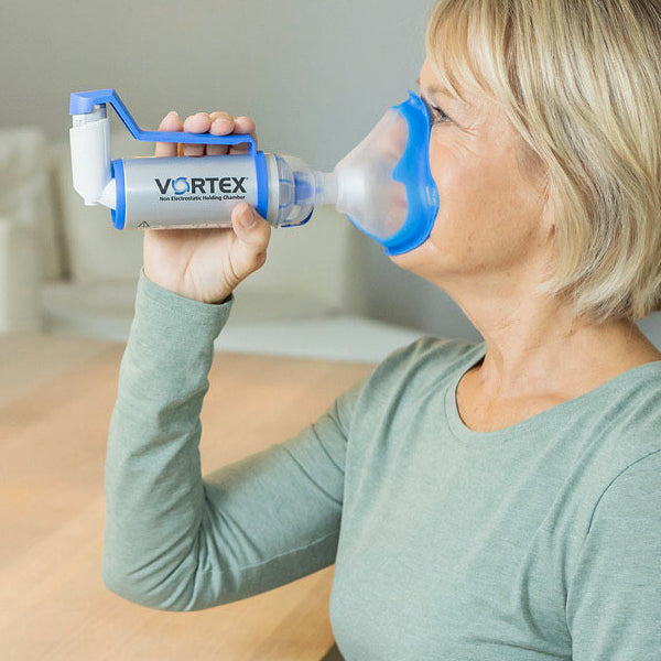 Woman using a Vortex VHC in a home setting