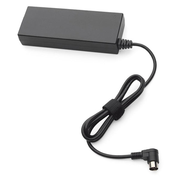 A black rectangular power adapter with a coiled black cable and a right-angle connector, shown on a plain white background.