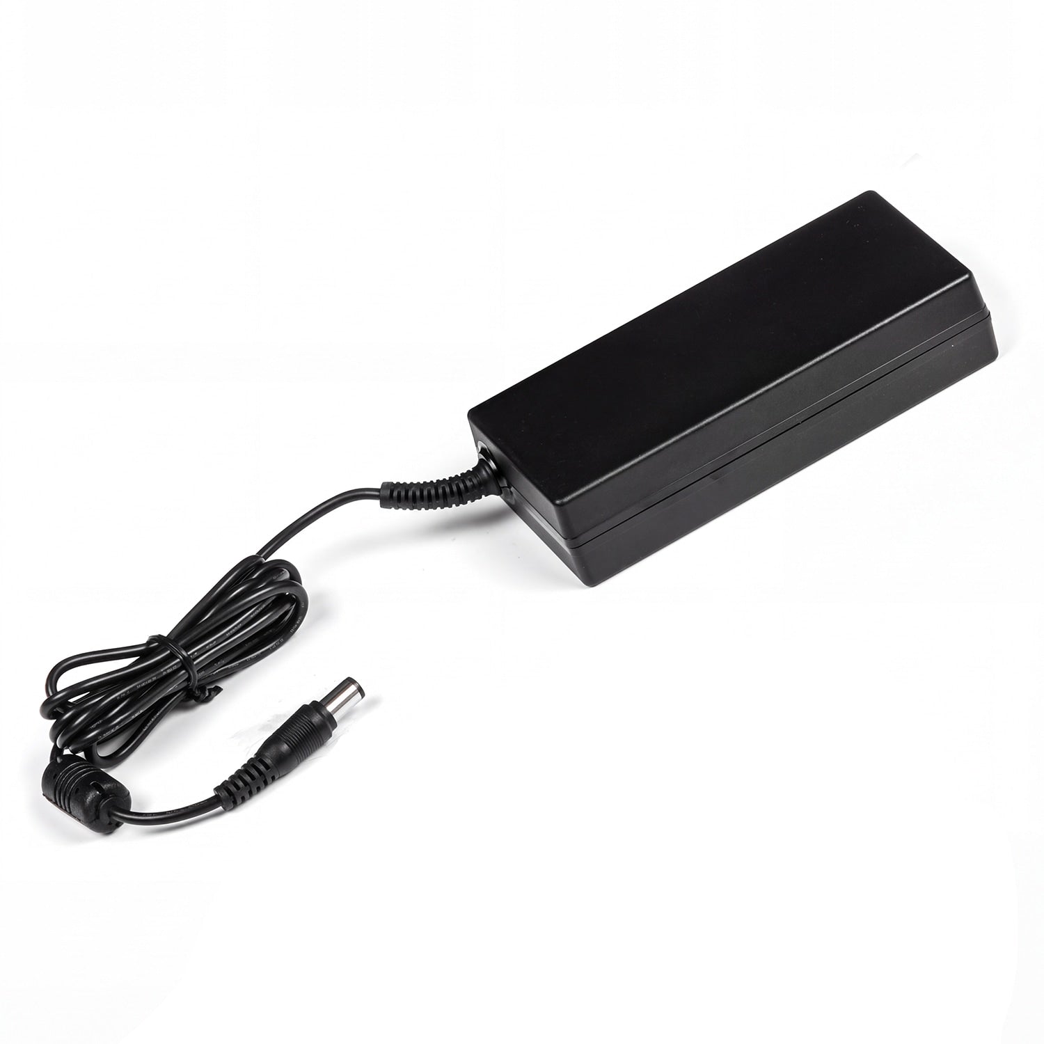A black rectangular power adapter with a coiled black cable and a barrel-style connector, photographed on a plain white background.