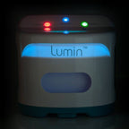 Lumin device with colorful lights on a dark background