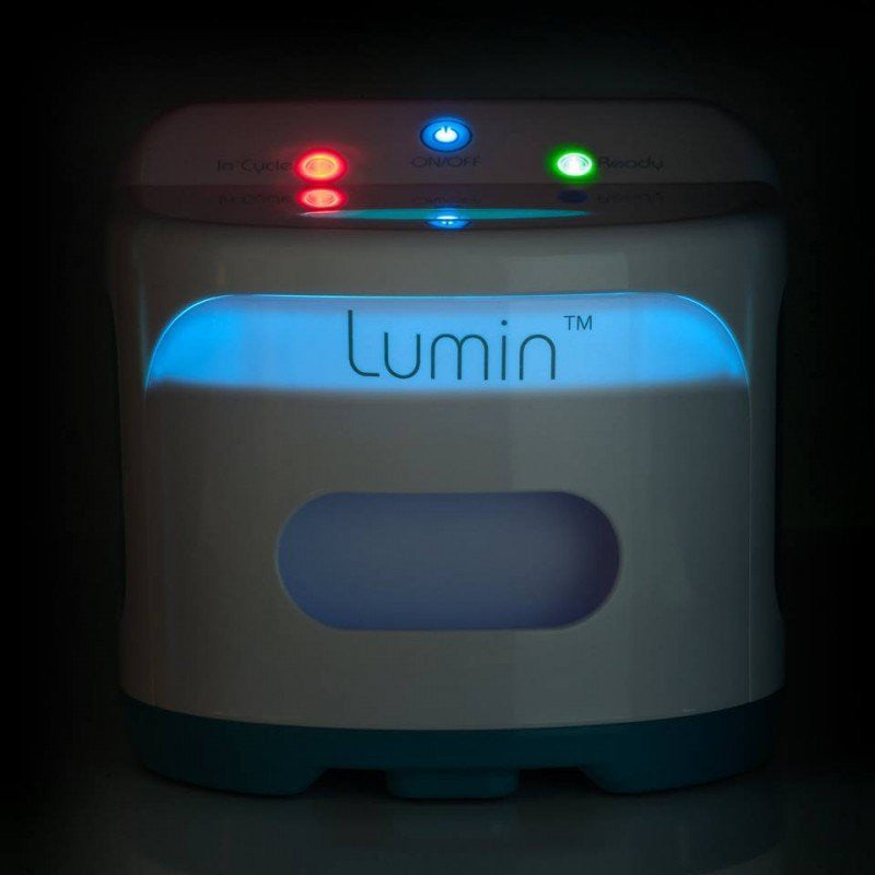 Lumin device with colorful lights on a dark background