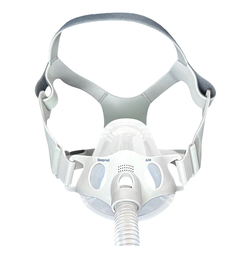 White CPAP mask with gray headgear on a white background