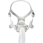 CPAP mask with hose on a white background
