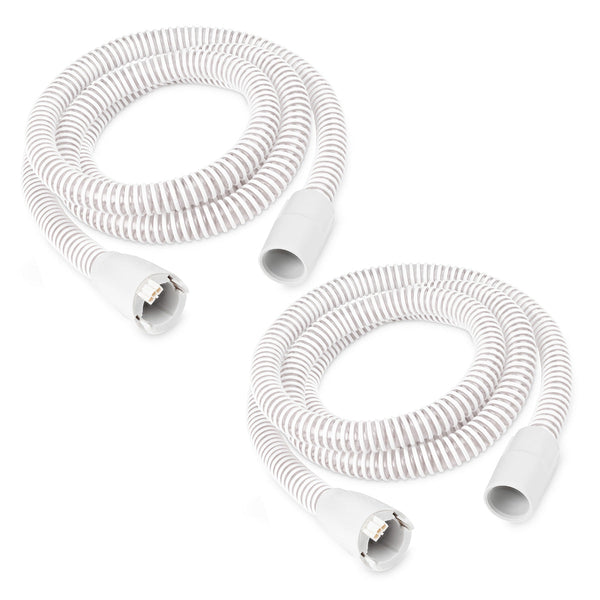 Two white hoses with connectors on a white background