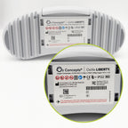 A white ribbed cylindrical device shown from the back with a circular inset zooming in at the bottom right on the printed label. The label reads O2 Concepts | Oxify LIBERTY' and includes regulatory marks and barcodes.