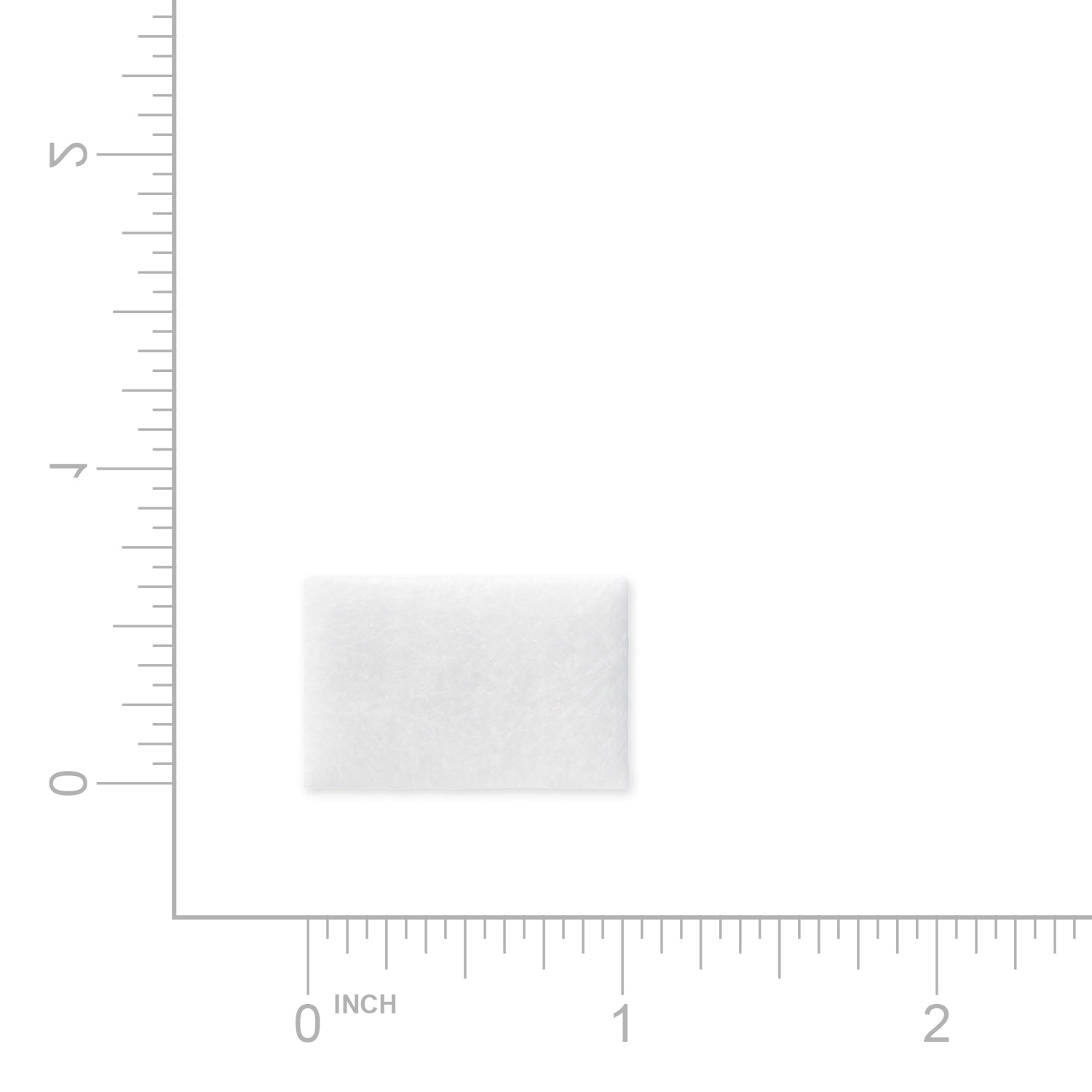White square sample with measurement scale on a white background